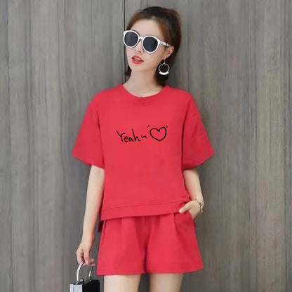 Conjunto de 2 piezas de camiseta de manga corta con cuello redondo, pantalones cortos y cintura definida, estampado de color liso y holgado para mujer