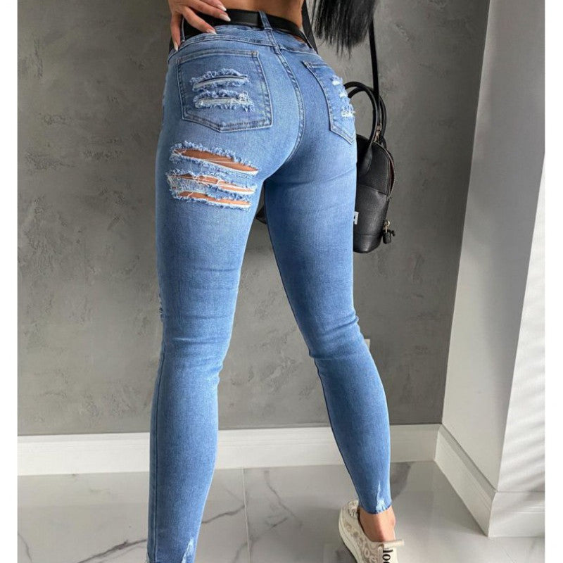 Vaqueros ajustados, rotos y de moda informal para mujer