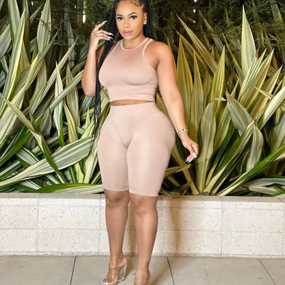 Conjunto deportivo de dos piezas para mujer, de verano, con camiseta sin mangas y pantalones cortos de color liso