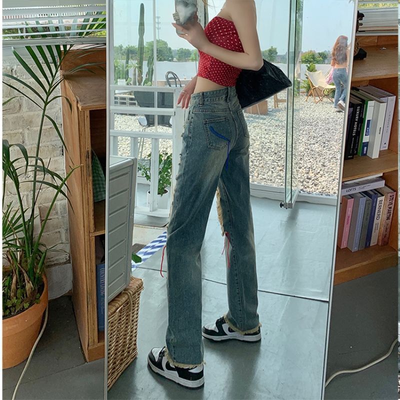 Vaqueros rotos de cintura alta estilo retro para mujer, estilo casual y moderno.