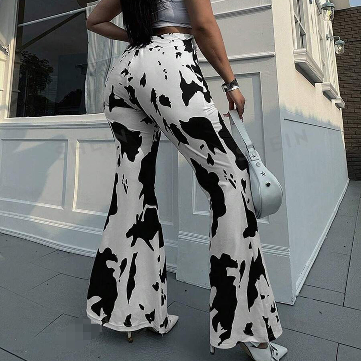 Pantalones acampanados de cintura alta con estampado de vaca para mujer