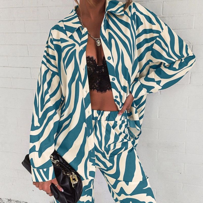 Conjunto de blusa y pantalón de manga larga con estampado de rayas informales a la moda para mujer