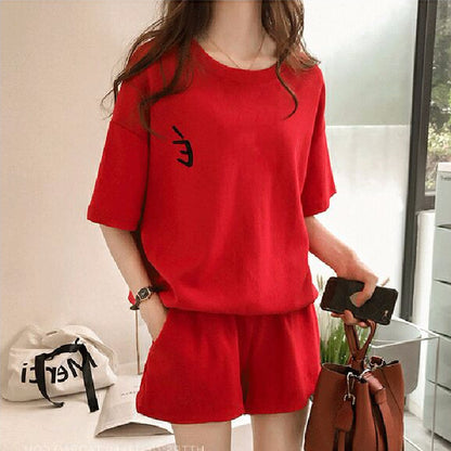 Conjunto de 2 piezas de camiseta de manga corta con cuello redondo, pantalones cortos y cintura definida, estampado de color liso y holgado para mujer