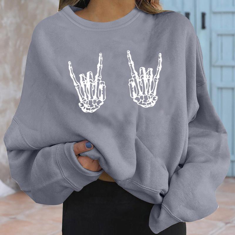 Sudadera holgada informal de moda con estampado de mano de esqueleto para mujer
