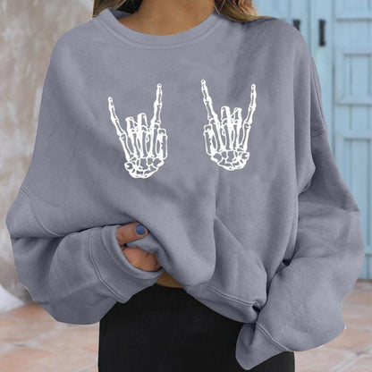 Sudadera holgada informal de moda con estampado de mano de esqueleto para mujer