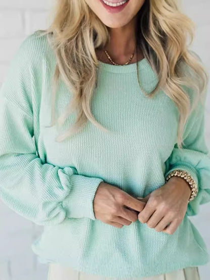 Sudadera informal holgada de color liso con cuello redondo y manga larga para mujer