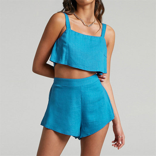 Conjunto de dos piezas de camiseta sin mangas y pantalones cortos de color liso para mujer