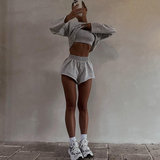 Conjunto deportivo informal de manga larga con jersey y pantalones cortos de color liso para mujer
