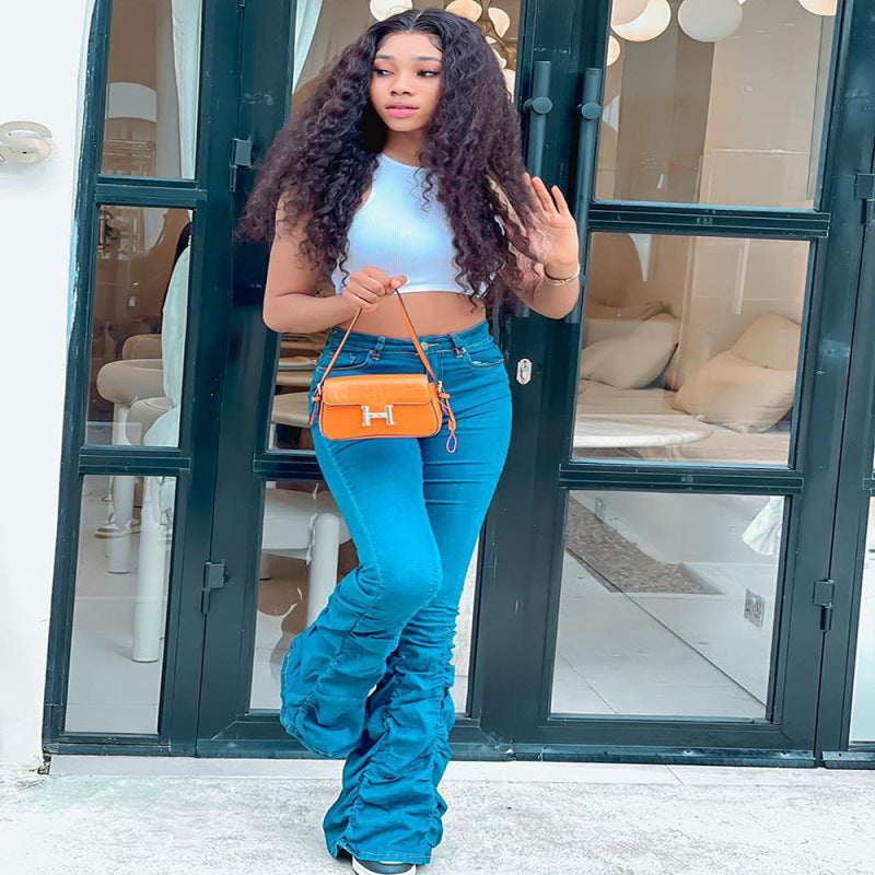 Vaqueros acampanados elásticos y arrugados de moda informal para mujer