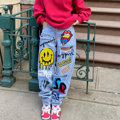 Vaqueros rotos con estampado de dibujos animados sonrientes para mujer