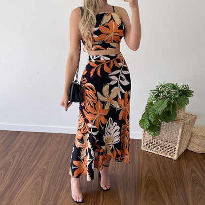 Conjunto de dos piezas para mujer, con top sin mangas y cuello halter estampado y falda de cintura alta, estilo informal y moderno para vacaciones.