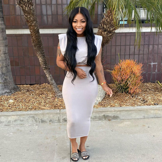Conjunto de dos piezas de top corto sin mangas de color liso para mujer, falda informal de moda