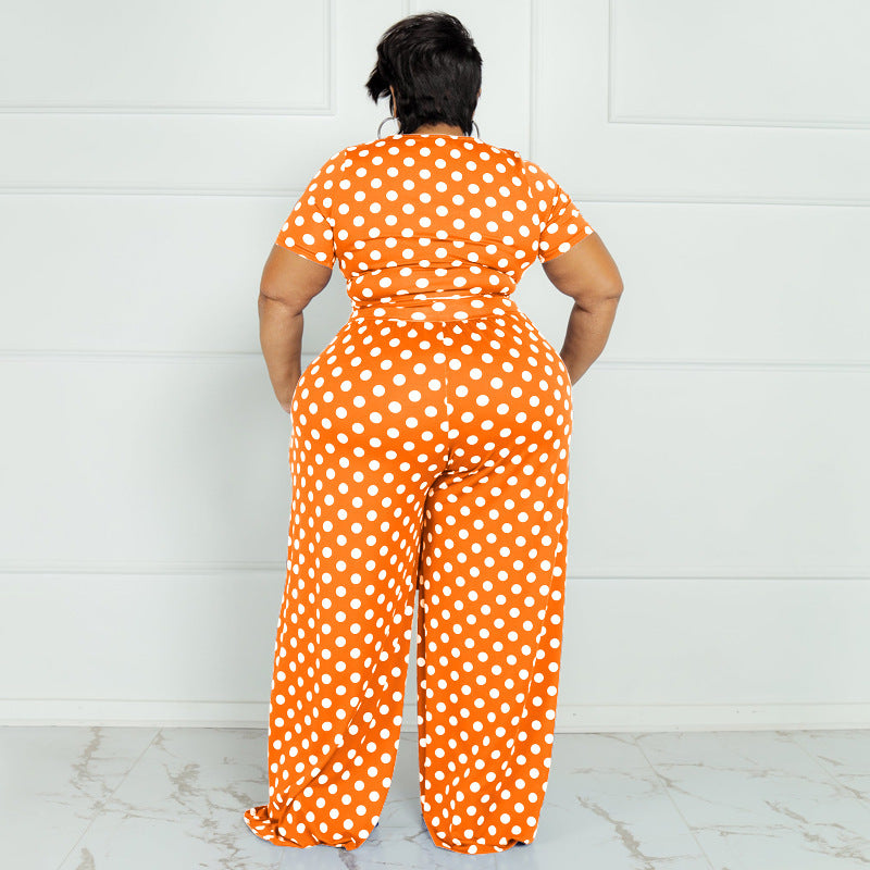 Traje informal de dos piezas con top de manga corta y pierna ancha con encaje de lunares para mujer de talla grande