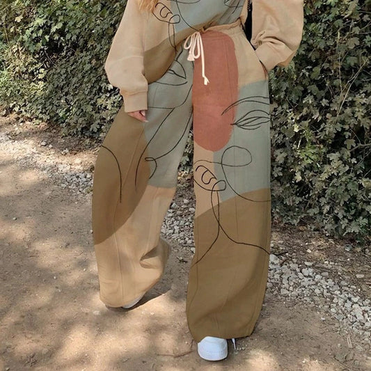 Conjunto de top y pantalón básico de manga larga con cuello redondo y estampado holgado para mujer