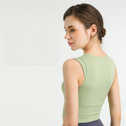 Camiseta deportiva sin mangas con cuello redondo, transpirable, de color sólido y ajustada, informal para mujer