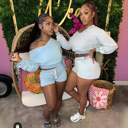 Conjunto de dos piezas de sudadera informal holgada de manga larga con tirantes y pantalones cortos para mujer