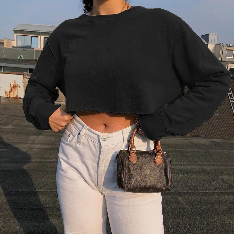 Sudadera corta informal de manga larga con estampado de color liso y atrevida para mujer