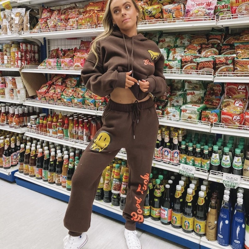 Conjunto de dos piezas con sudadera y pantalón estampado holgado informal para mujer