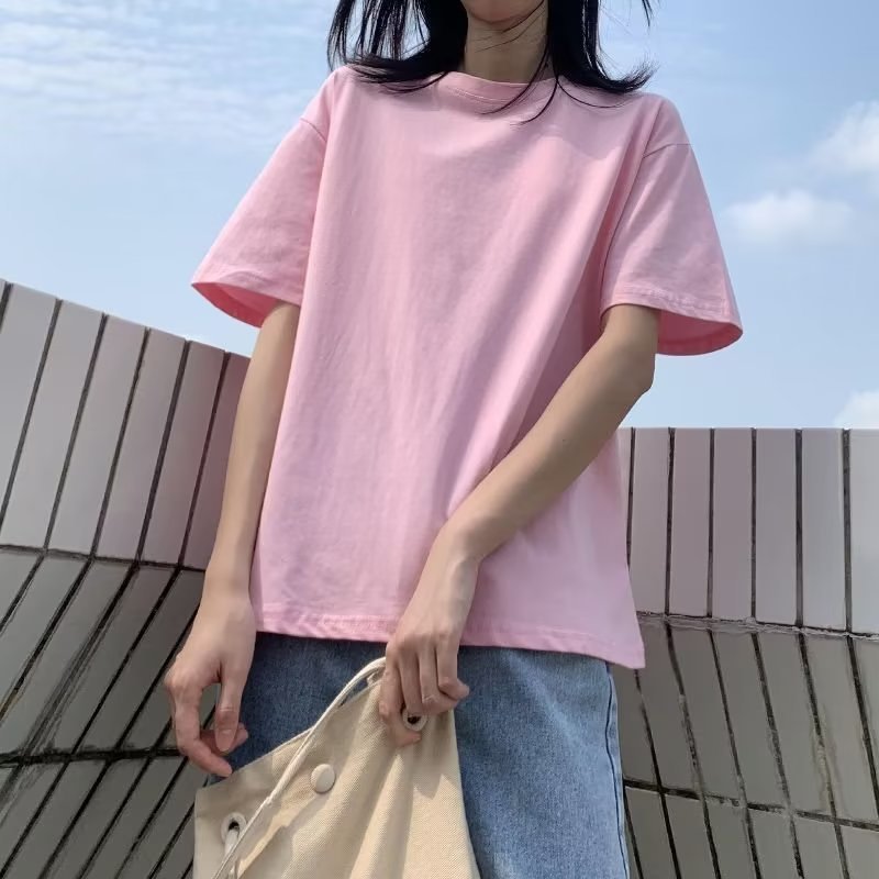 Camiseta básica holgada informal de color liso con cuello redondo para mujer