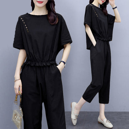 Conjunto de dos piezas formado por top y pantalón de manga corta y cuello redondo, informal, a la moda para mujer