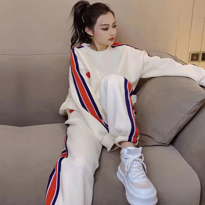 Conjunto de dos piezas holgado e informal con top y pantalón de manga larga con cuello redondo y estampado en contraste para mujer