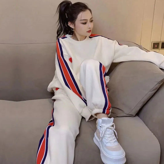 Conjunto de dos piezas holgado e informal con top y pantalón de manga larga con cuello redondo y estampado en contraste para mujer