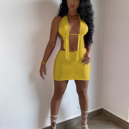 Conjunto de dos piezas de top y falda irregulares con tirantes halter de color liso para mujer