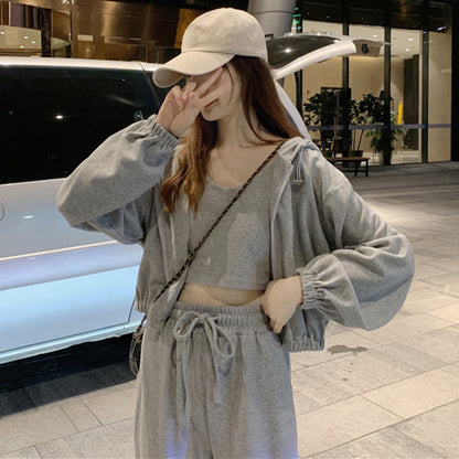Conjunto informal de tres piezas con capucha, camiseta sin mangas y pantalones elásticos de cintura alta para mujer, color liso