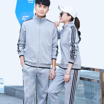 Conjunto deportivo informal para hombre y mujer con sudadera y pantalones de chándal con cremallera y estampado de rayas en contraste para pareja