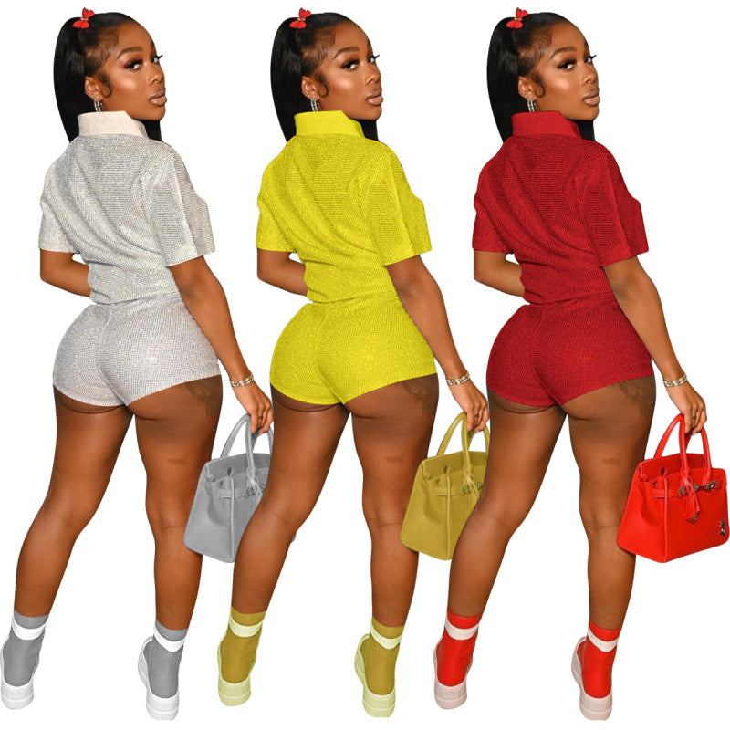 Conjunto de dos piezas de top y pantalones cortos con solapa de manga corta y estilo casual vanguardista para mujer