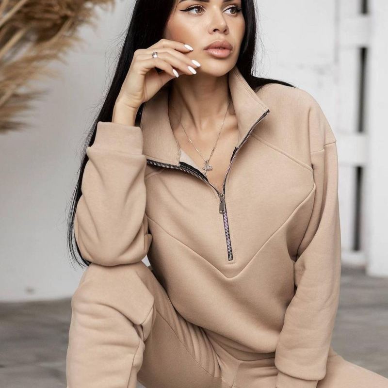 Conjunto de dos piezas de jersey deportivo informal con capucha y manga larga de color liso para mujer