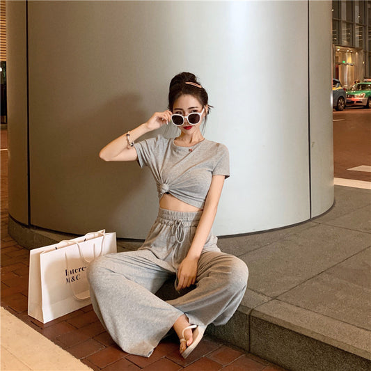 Conjunto de dos piezas de top y pantalón de manga corta de color liso informal para mujer