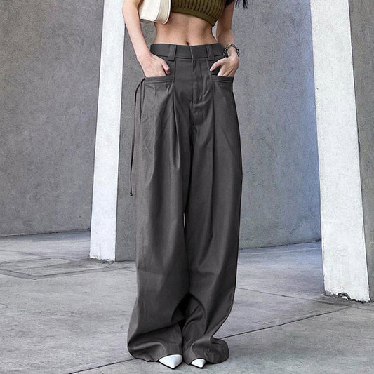 Pantalones casuales holgados de talle bajo con bolsillos y color liso para mujer