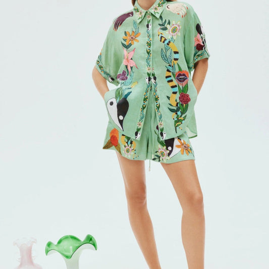 Conjunto de dos piezas de camisa y pantalones cortos de manga corta con estampado floral informal para mujer