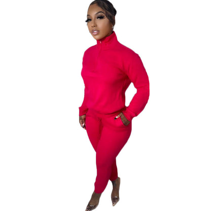 Conjunto deportivo informal de dos piezas para mujer, sudadera y pantalones de manga larga con cremallera y cuello alto en color liso