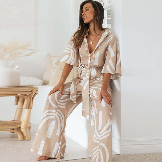 Mono holgado informal de moda para mujer con estampado geométrico, solapa, media manga y cinturón