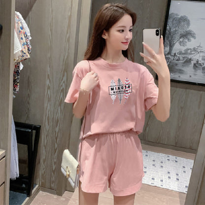 Conjunto de 2 piezas de camiseta de manga corta con cuello redondo, pantalones cortos y cintura definida para mujer