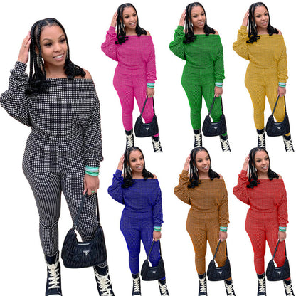Conjunto de dos piezas de top y pantalón holgados informales de manga larga con cuello oblicuo y estampado a cuadros para mujer