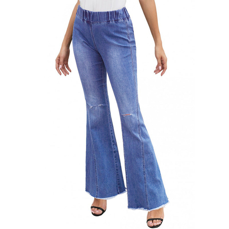 Vaqueros rasgados, holgados, acampanados y de color liso, informales, a la moda para mujer