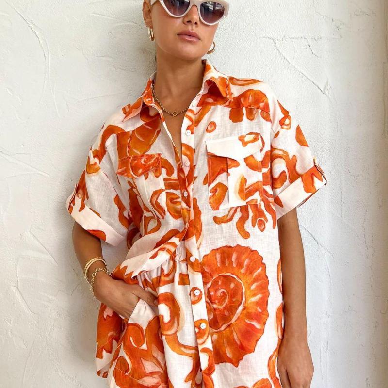 Conjunto de dos piezas de camisa y pantalones cortos de manga corta con estampado gráfico informal a la moda para mujer