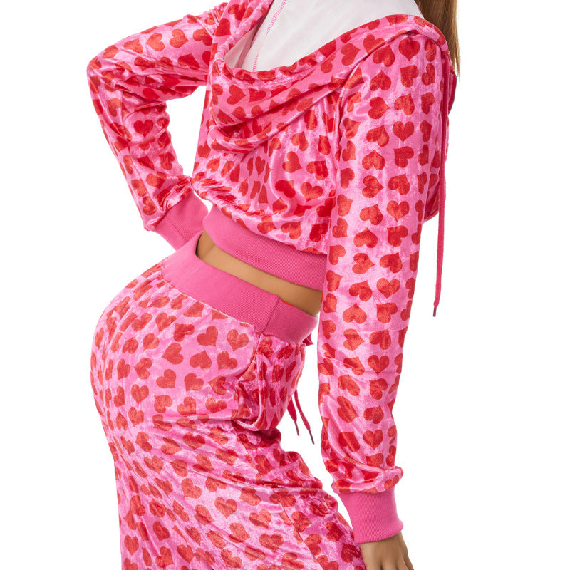 Conjunto informal de dos piezas con capucha y pantalones de cintura alta y top de manga larga con estampado de corazón para mujer