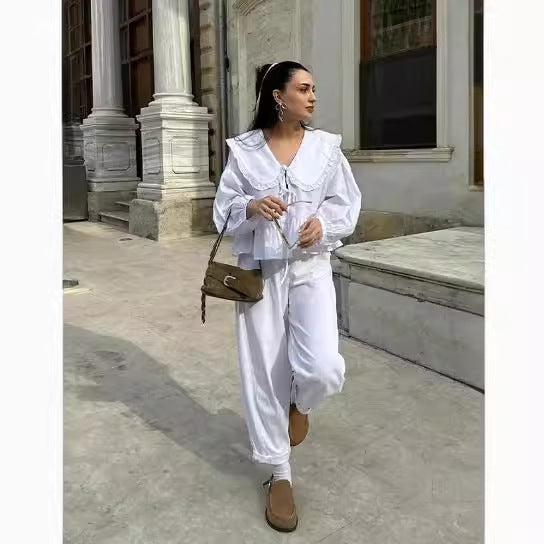 Camisa de encaje con cuello de muñeca de color liso informal a la moda para mujer