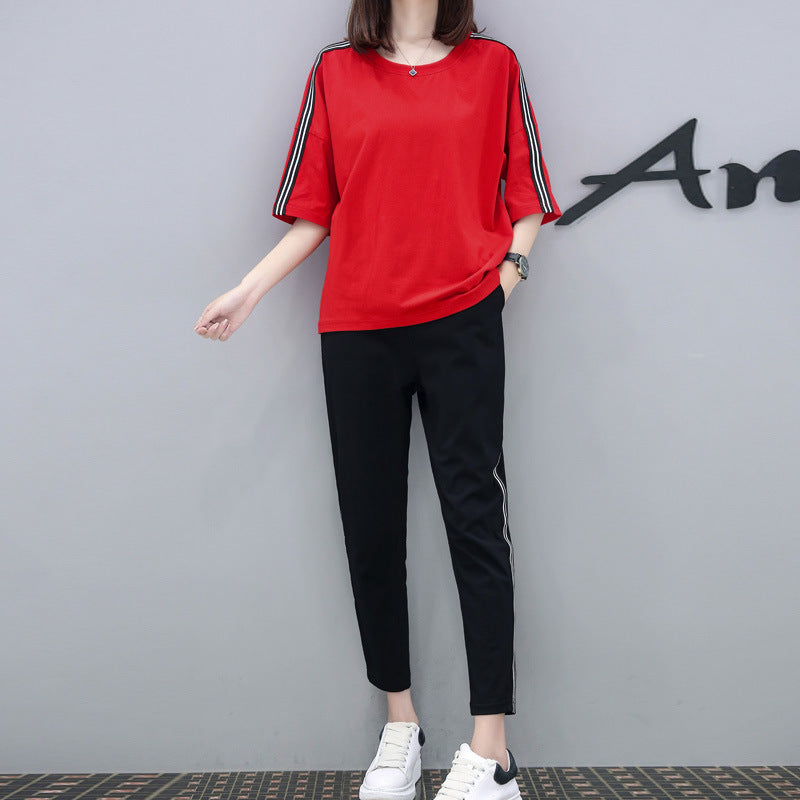 Conjunto de dos piezas de top y pantalón de manga corta con cuello redondo y rayas informales a la moda para mujer