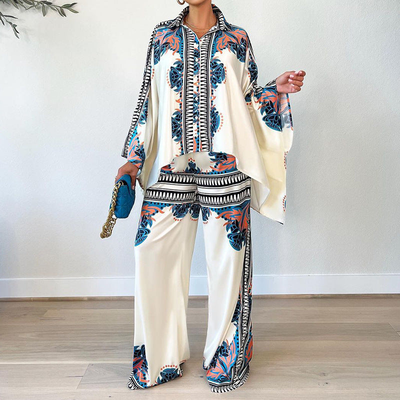Conjunto de dos piezas de blusa y pantalones holgados con mangas murciélago y estampado informal de verano para mujer