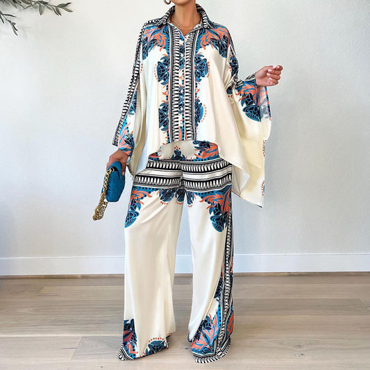 Conjunto de dos piezas de blusa y pantalones holgados con mangas murciélago y estampado informal de verano para mujer