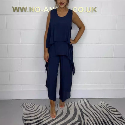Conjunto de top y pantalones cortos informales sin mangas de color liso de talla grande a la moda para mujer