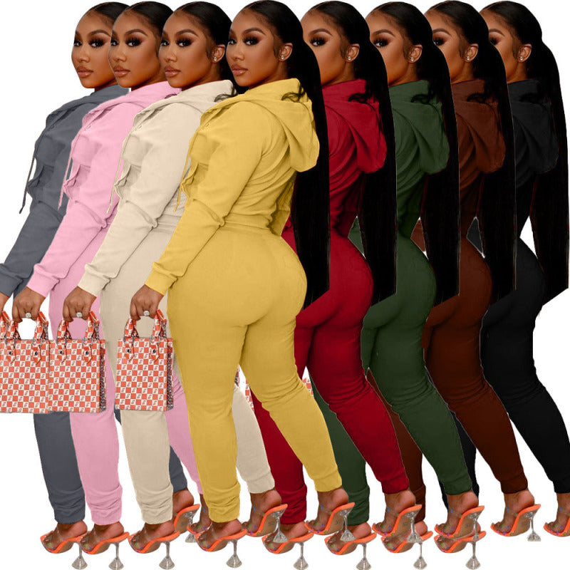 Conjunto deportivo informal de top y pantalón de manga larga con capucha y cremallera de color liso para mujer