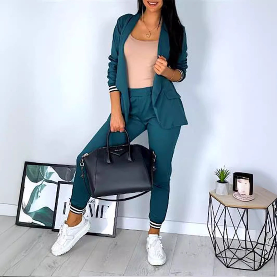 Conjunto de dos piezas formado por chaqueta y pantalón, manga larga, color liso, informal, a la moda para mujer