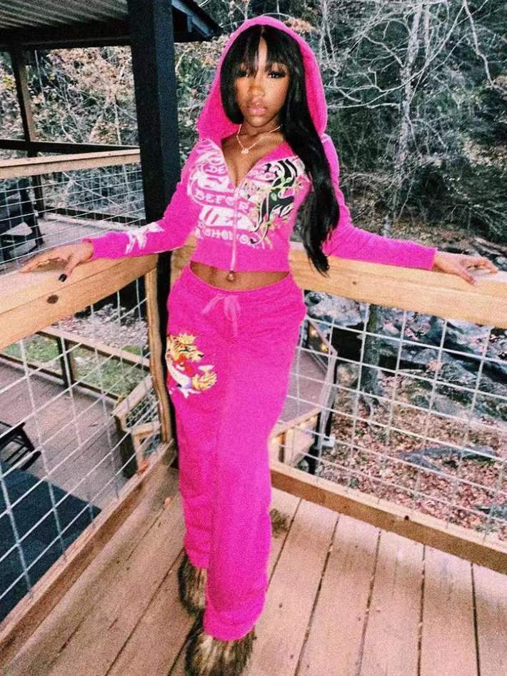 Conjunto de dos piezas de top y pantalón con cremallera y manga larga con estampado informal a la moda para mujer