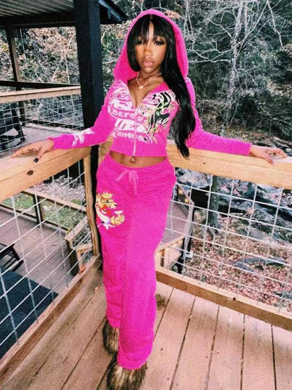 Conjunto de dos piezas de top y pantalón con cremallera y manga larga con estampado informal a la moda para mujer